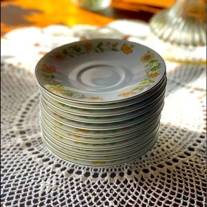 Set of 10 beautiful saucers. (No cups)